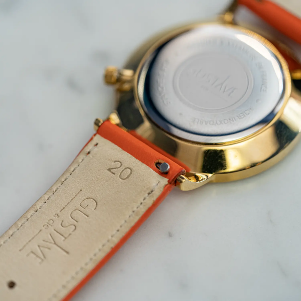 Bracelet cuir orange surpiqûres